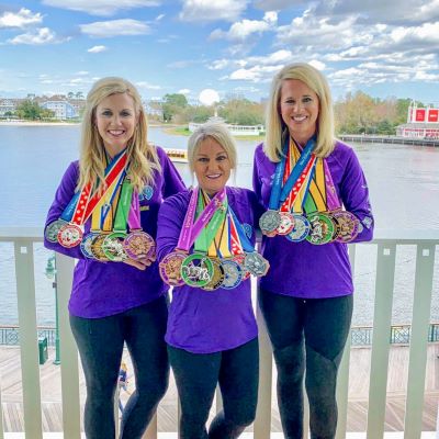 Celebrating with our runDisney medals at Disney's Boardwalk Resort
