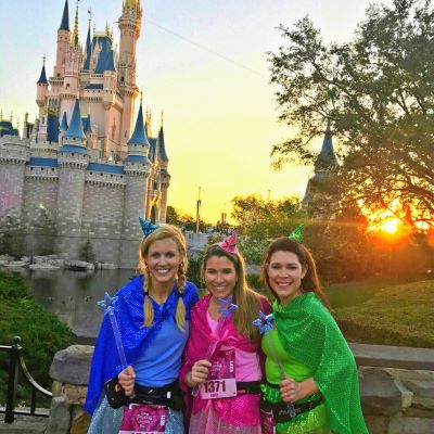 Posing at sunrise during our runDisney race