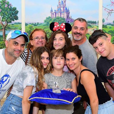 Our family photo with Cinderella's glass slipper