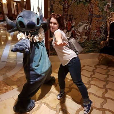 Posing with Stitch on a Disney Cruise
