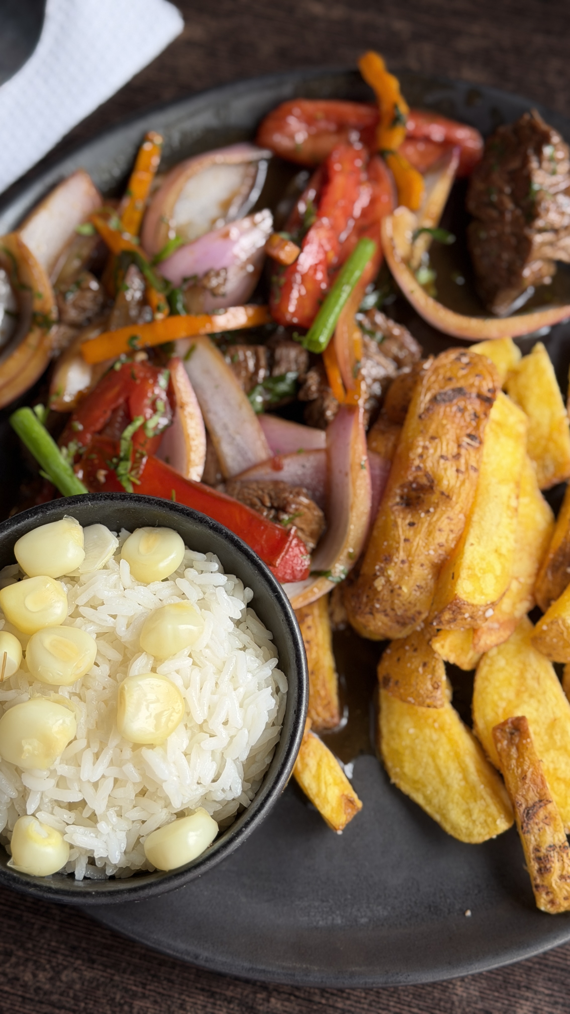 Lomo saltado, one of Peru’s best-known dishes, served with rice, corn and fried potatoes during the journey.